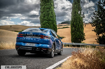 Ford Capri – rear three-quarter, blue on a country road