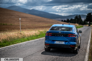 Ford Capri – rear three-quarter, bright blue on a country road