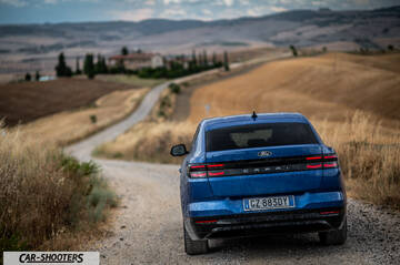 Ford Capri – rear view, blue metallic on a country road