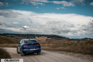 Ford Capri – rear view, blue metallic on a country road