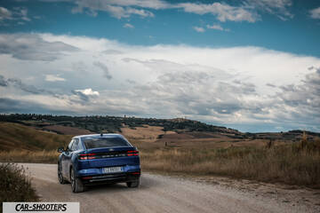Ford Capri – rear view, blue metallic on a country road
