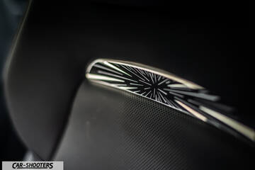 Tesla Model 3 Performance – detail, seat badge close-up